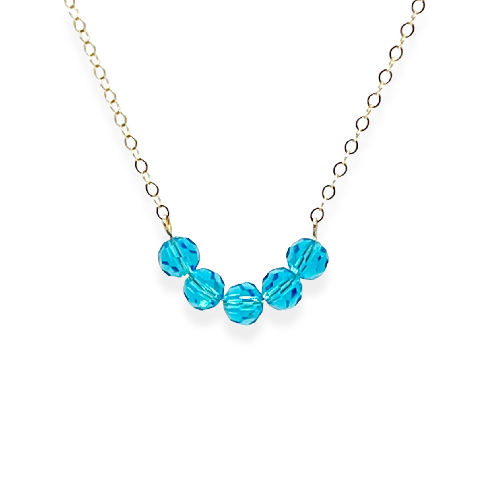The Crystal Arc Necklace brings a playful twist to a minimal silhouette. Featuring a smooth, curved, colorful crystal arc, it’s designed to rest beautifully along your neckline. This piece adds an effortless pop of color that’s perfect for layering or wearing solo when you want a simple statement.
