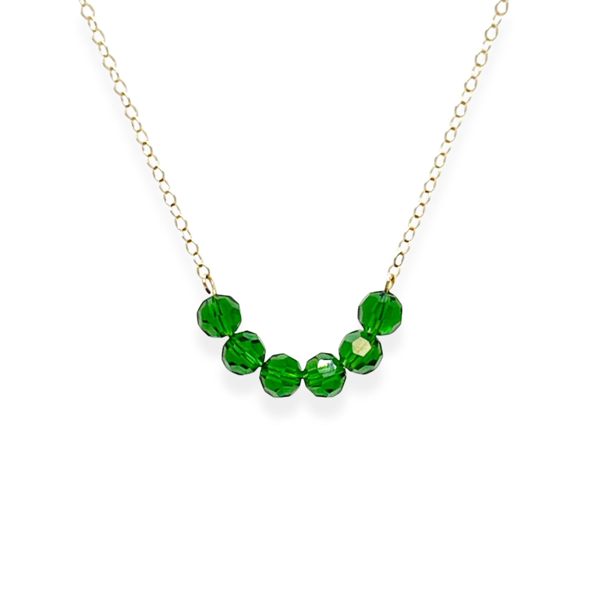 The Crystal Arc Necklace brings a playful twist to a minimal silhouette. Featuring a smooth, curved, colorful crystal arc, it’s designed to rest beautifully along your neckline. This piece adds an effortless pop of color that’s perfect for layering or wearing solo when you want a simple statement.