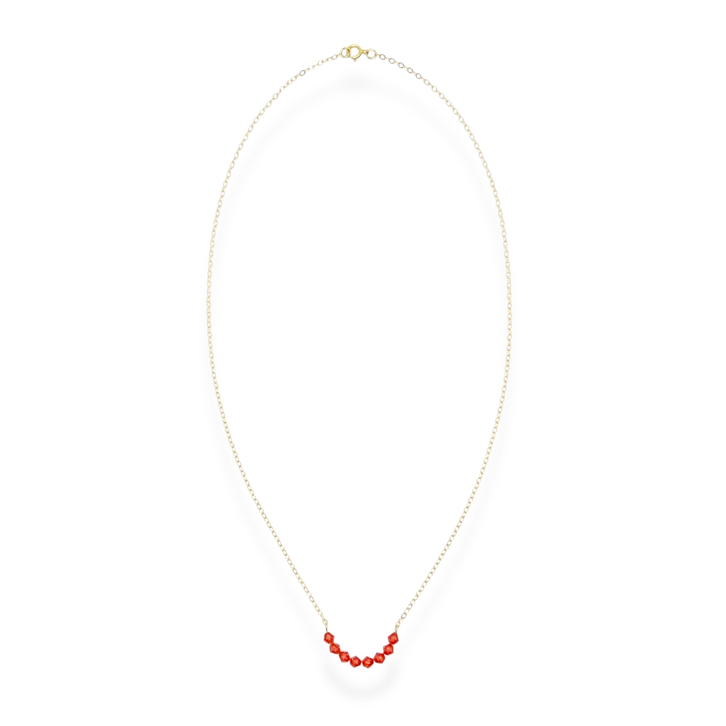 The Crystal Arc Necklace brings a playful twist to a minimal silhouette. Featuring a smooth, curved, colorful crystal arc, it’s designed to rest beautifully along your neckline. This piece adds an effortless pop of color that’s perfect for layering or wearing solo when you want a simple statement.