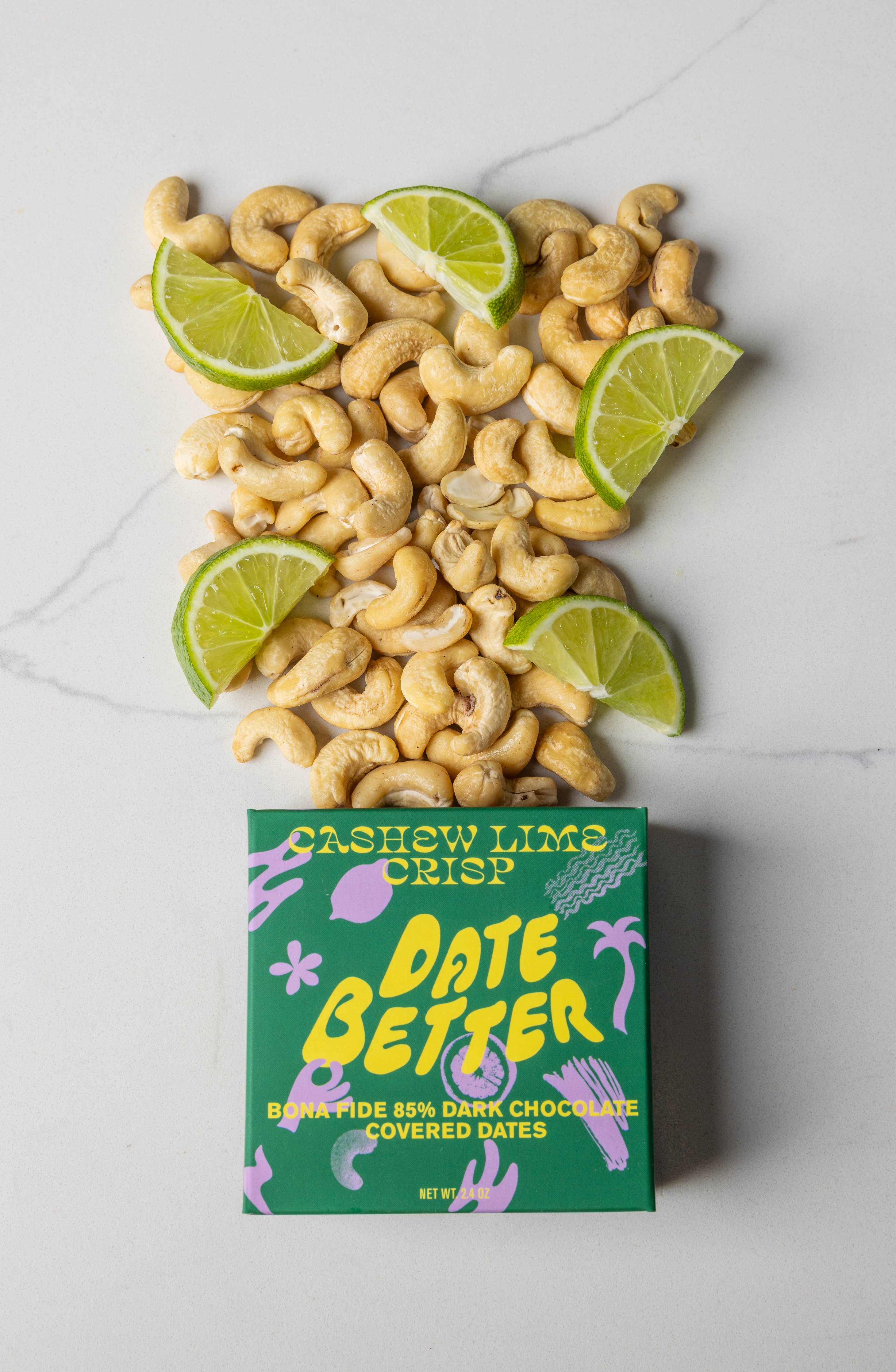 Cashew Lime Crisp Date Better packaging with cashews and lime slices on a white background