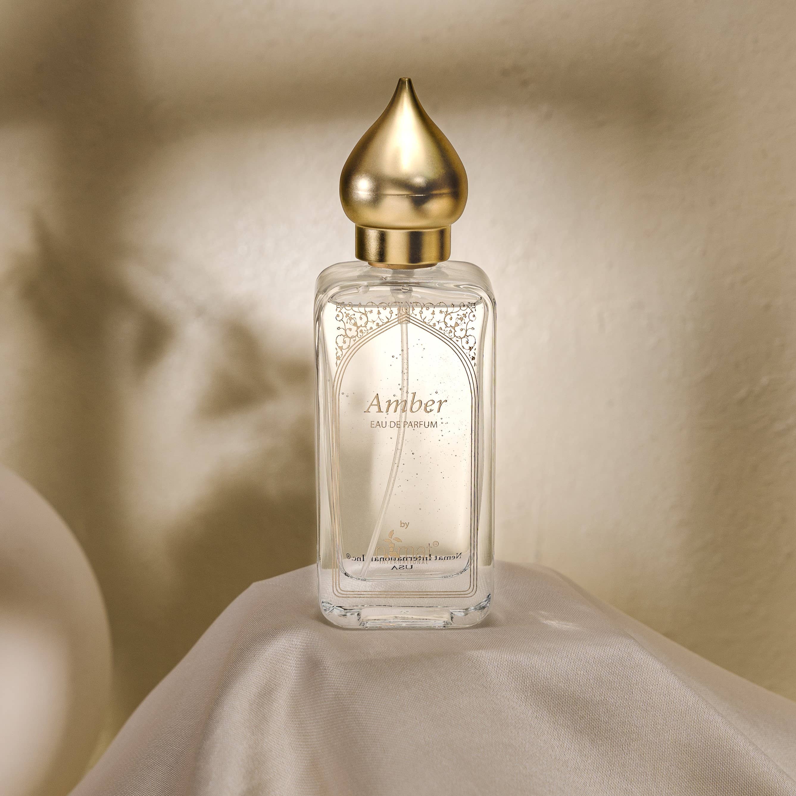 Nemat’s Amber Eau de Parfum combines fresh floral, woody, and clean musk notes, creating a timeless, subtle fragrance that blends with your body chemistry for a unique scent.