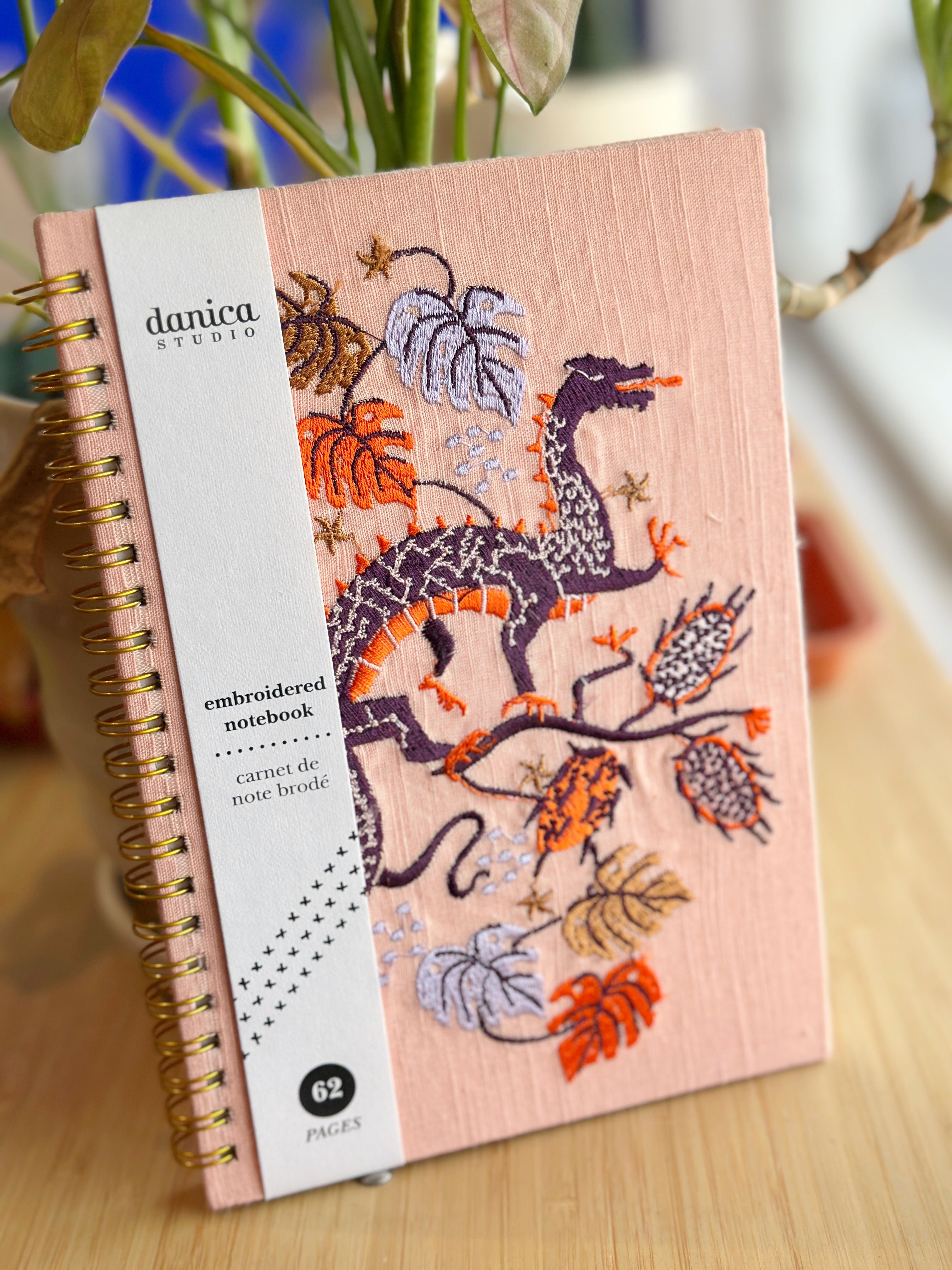 The ember ring bound notebook features an embroidered dragon and bold design, sparking inspiration and igniting the fire of your most epic ideas.
