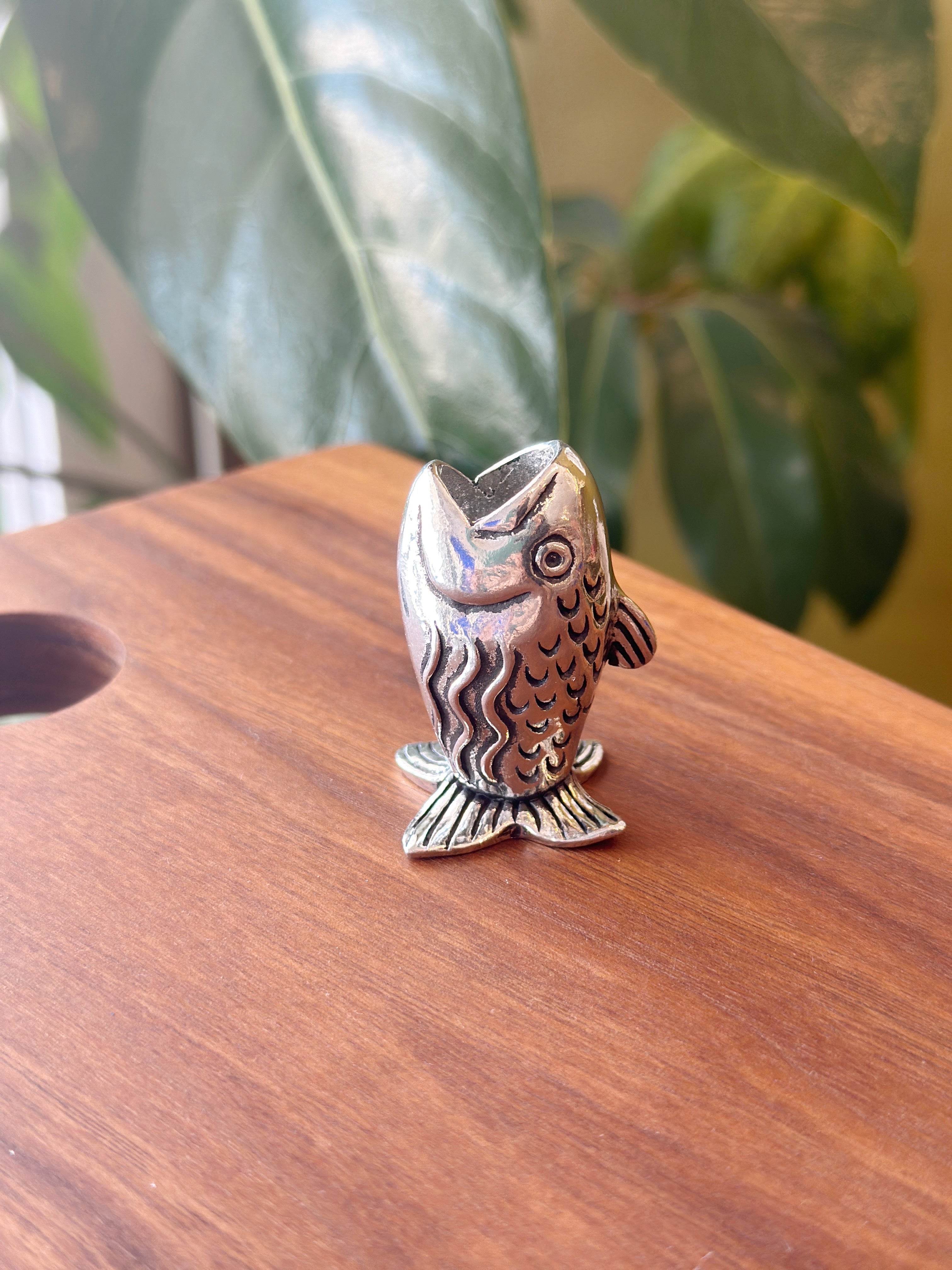 Keep your toothpicks within reach with a playful Fish Toothpick Holder. It's the perfect gift for the avid fisherman in your life or someone that just enjoys a cute table accessory. It's not just for toothpicks; it makes a great match holder too! Fine hand-crafted pewter, made in Canada.