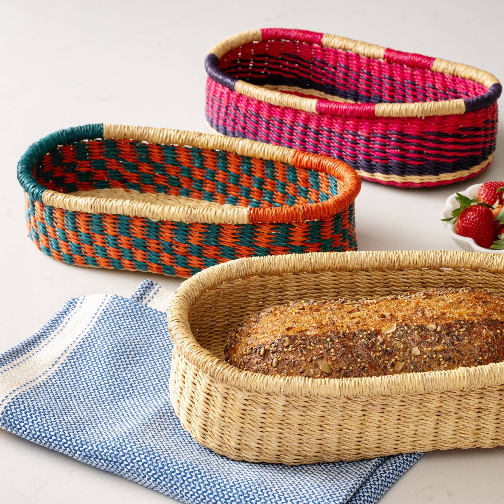 Add these bright, handcrafted baskets to your table, shelf or closet - the uses are limited only by your imagination! Gorgeously handwoven from locally sourced veta vera grass, the utilitarian design features an assortment of vibrant colors. Each one is woven while wet and can be re-shaped by adding water, perfect for the kitchen and bath! Durable and washable, these baskets are a beautiful and unique addition to any decor.&nbsp;