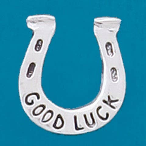 Carry around some good luck! This Good Luck Coin is the perfect little addition to carry around in your bag or decorate little spaces around your home. The front of the coin features a horseshoe and the back of the coin reads "Good Luck". Fine hand-crafted pewter, made in Canada.