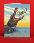 Card with an alligator and 'F***!' text on a red background
