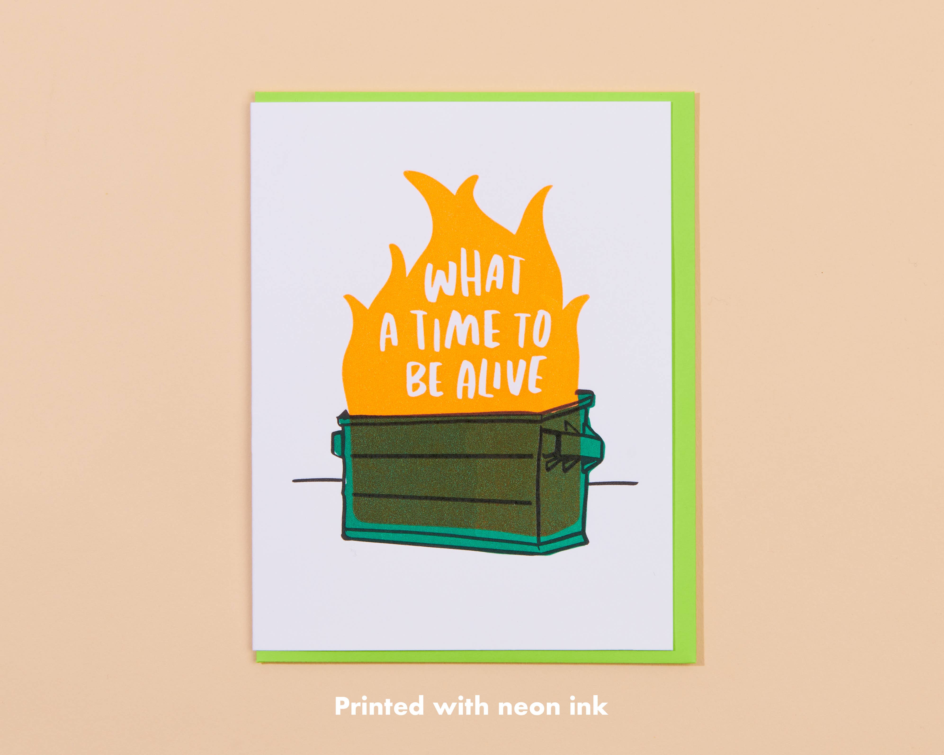 Card with flames and text 'What a time to be alive' on a beige background