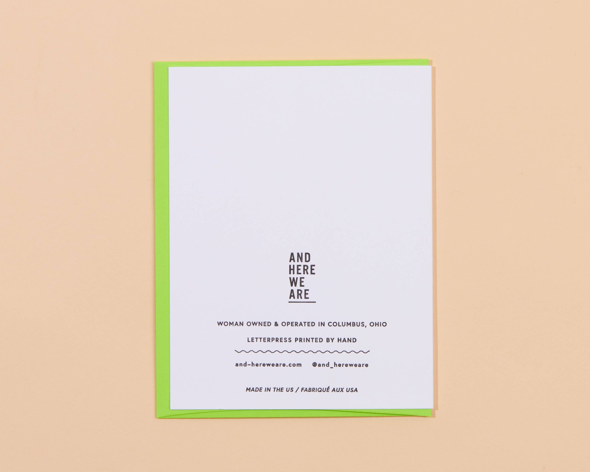 White card with black text on a beige background