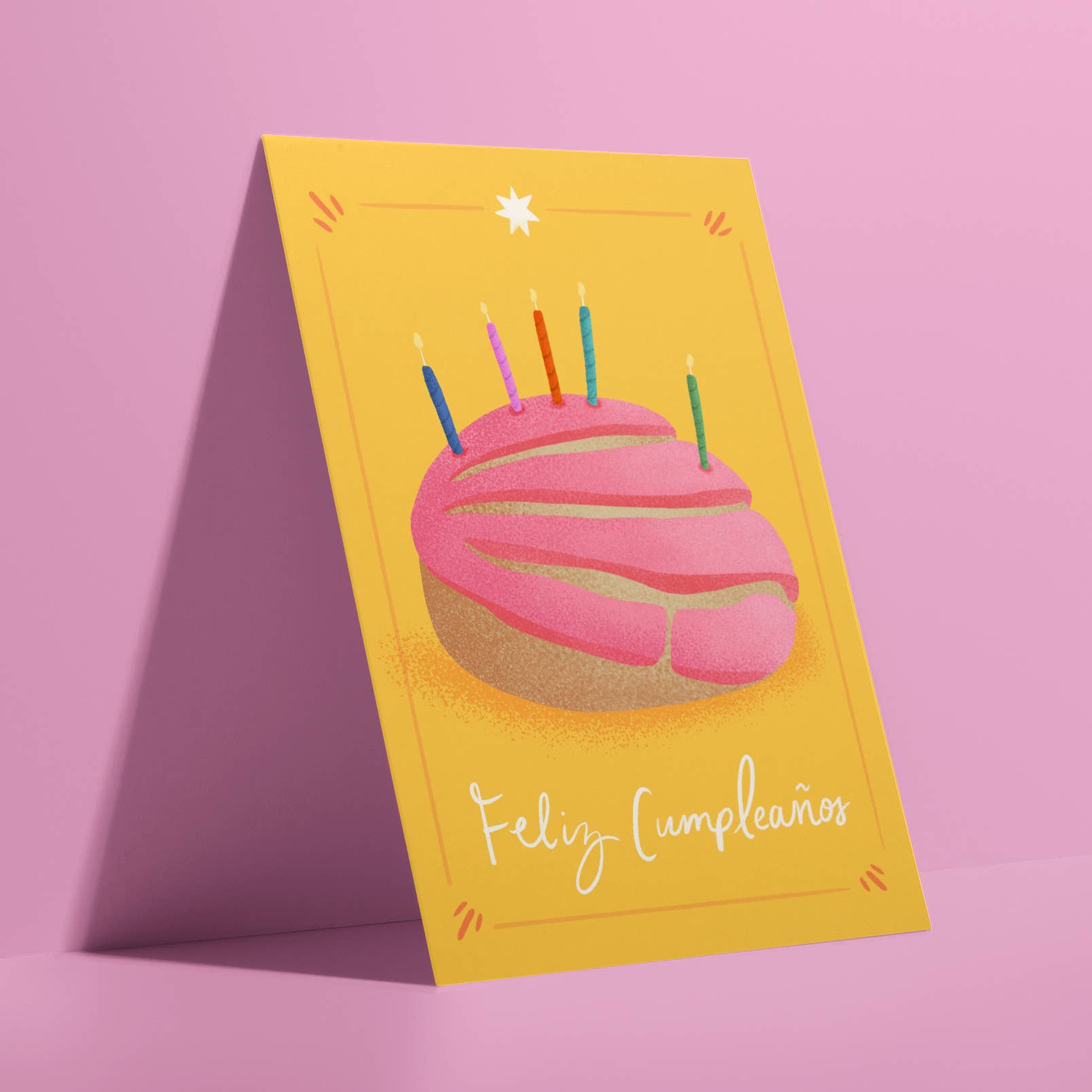 This colorful birthday card features a perfect pink concha adorned with birthday candles. Celebrate Hispanic Heritage Month with Ana Peake's Spanish Greeting Cards, adorned with stunning Mexican Folk Art Inspired Illustrations! These beautifully designed cards, perfect for honoring Hispanic heritage and spreading joy on special occasions.