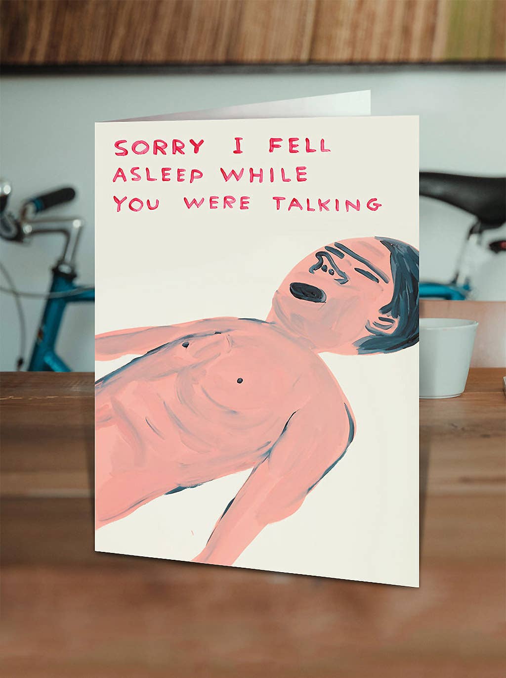 Apologize (sort of) in style with our Fell Asleep Talking Greeting Card, featuring the unmistakably quirky artwork of David Shrigley. Perfect for birthdays, everyday humor, or just sending a little cheeky honesty, this card is blank inside so you can add your own message—or let Shrigley’s dry humor do the talking.