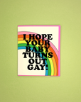 Card with rainbow design and text on a green background