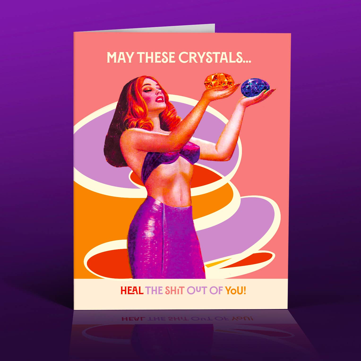 Card with a stylized illustration of a woman holding crystals against a purple background
