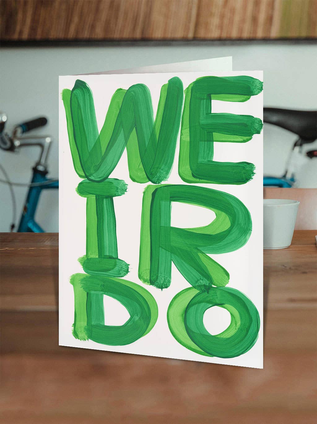 Celebrate the wonderfully strange with our Weirdo Greeting Card, featuring the unmistakably quirky artwork of David Shrigley. Perfect for birthdays, everyday laughs, or sending a little oddball joy, this card is blank inside so you can craft your own message—or let the weirdness speak for itself.