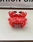 Bring a playful, beachy vibe to your hair with this red crab-shaped claw clip. Made from smooth acetate, it’s lightweight and easy to style, adding a whimsical touch to everyday looks or summer outfits. Perfect for sea-life lovers or anyone who wants a fun, cheerful accessory.