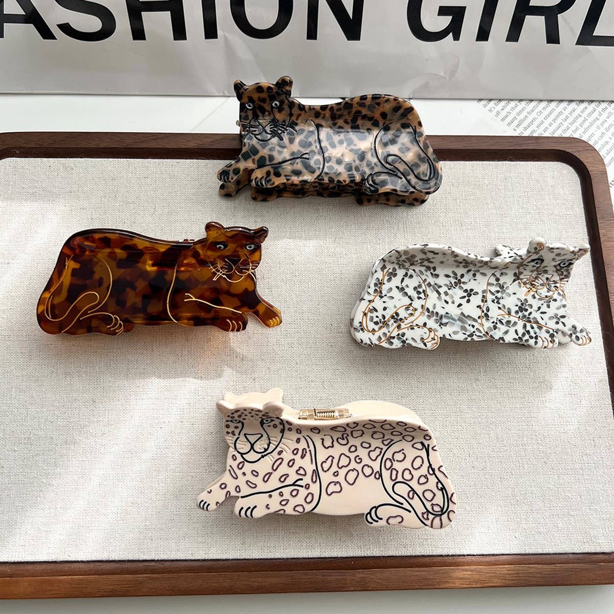 Add a touch of wild style to your hair with this leopard-print claw clip. Made from smooth acetate, it’s lightweight yet strong, keeping your hair secure while adding a bold, playful pattern to any look. Perfect for animal print lovers or anyone looking to make a stylish statement.