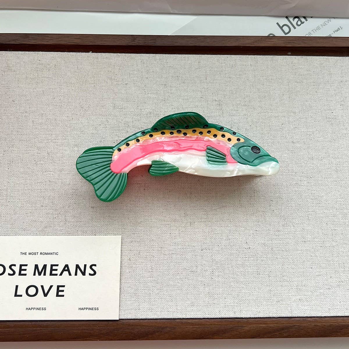 Make a playful, outdoorsy statement with this rainbow trout-shaped hair claw clip. Crafted from smooth acetate, it’s lightweight yet secure, adding a whimsical, nature-inspired touch to your look. Perfect for anglers, animal lovers, or anyone who enjoys a quirky, eye-catching accessory.