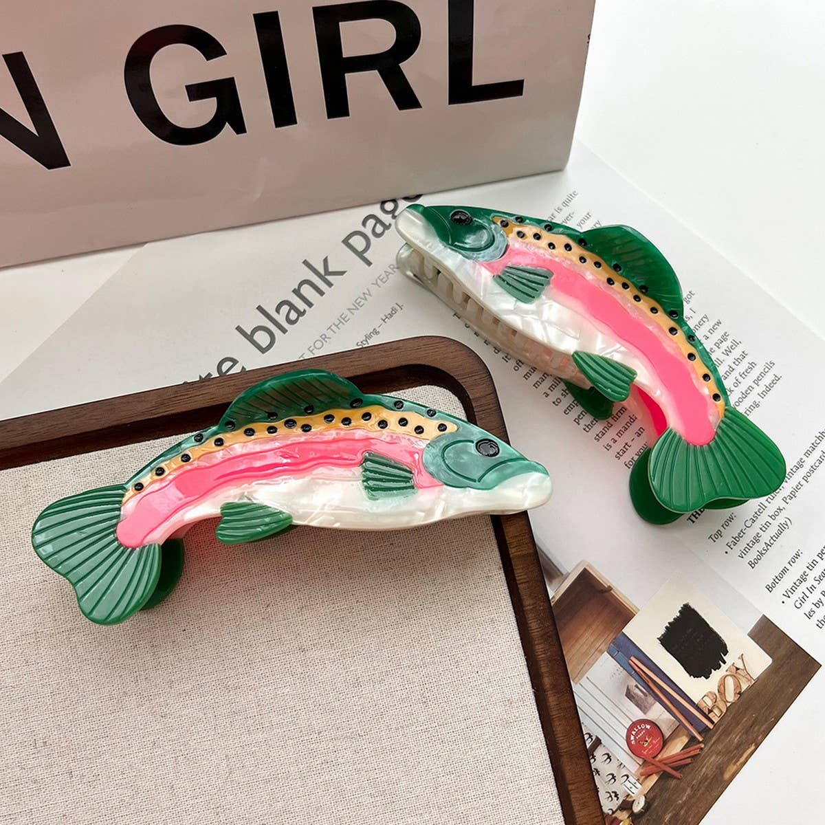 Make a playful, outdoorsy statement with this rainbow trout-shaped hair claw clip. Crafted from smooth acetate, it’s lightweight yet secure, adding a whimsical, nature-inspired touch to your look. Perfect for anglers, animal lovers, or anyone who enjoys a quirky, eye-catching accessory.