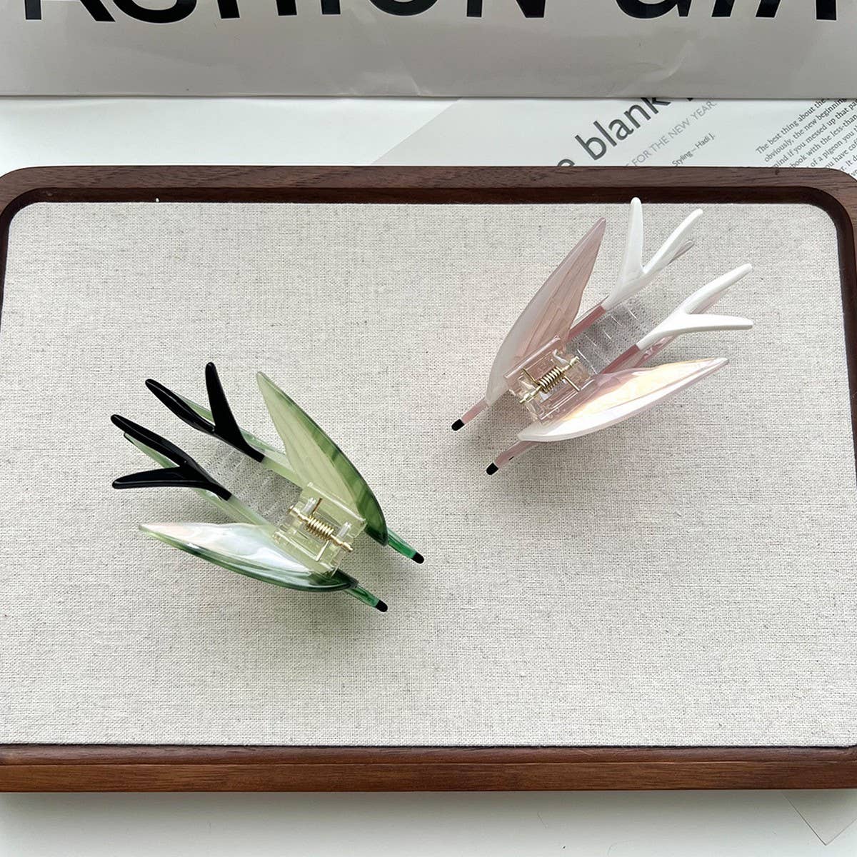 Add a touch of whimsy to your hairstyle with this pink swallow-shaped hair claw clip. Crafted from smooth acetate, it’s lightweight and easy to wear, bringing a playful, nature-inspired accent to everyday looks. Perfect for layering with other clips or wearing on its own for a charming, elegant finish.