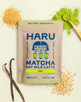 Haru Matcha Oat Milk Latte package with matcha powder, oats, and vanilla beans on a light background