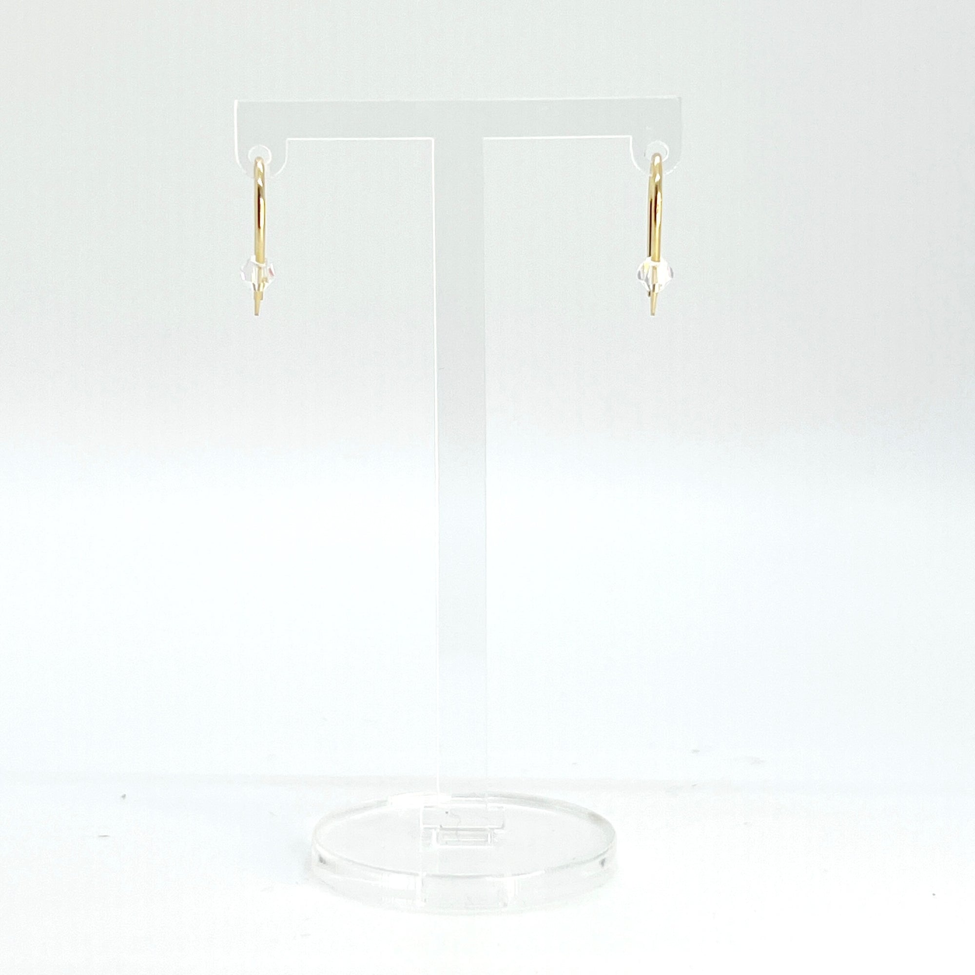 Simple and expressive, the Horseshoe Pull-Through Hoops are a fresh take on everyday earrings. Their petite arc shape hugs the lobe just right, while a single crystal adds a glint of light and intention. Minimal yet full of meaning, these are the earrings you’ll reach for again and again.