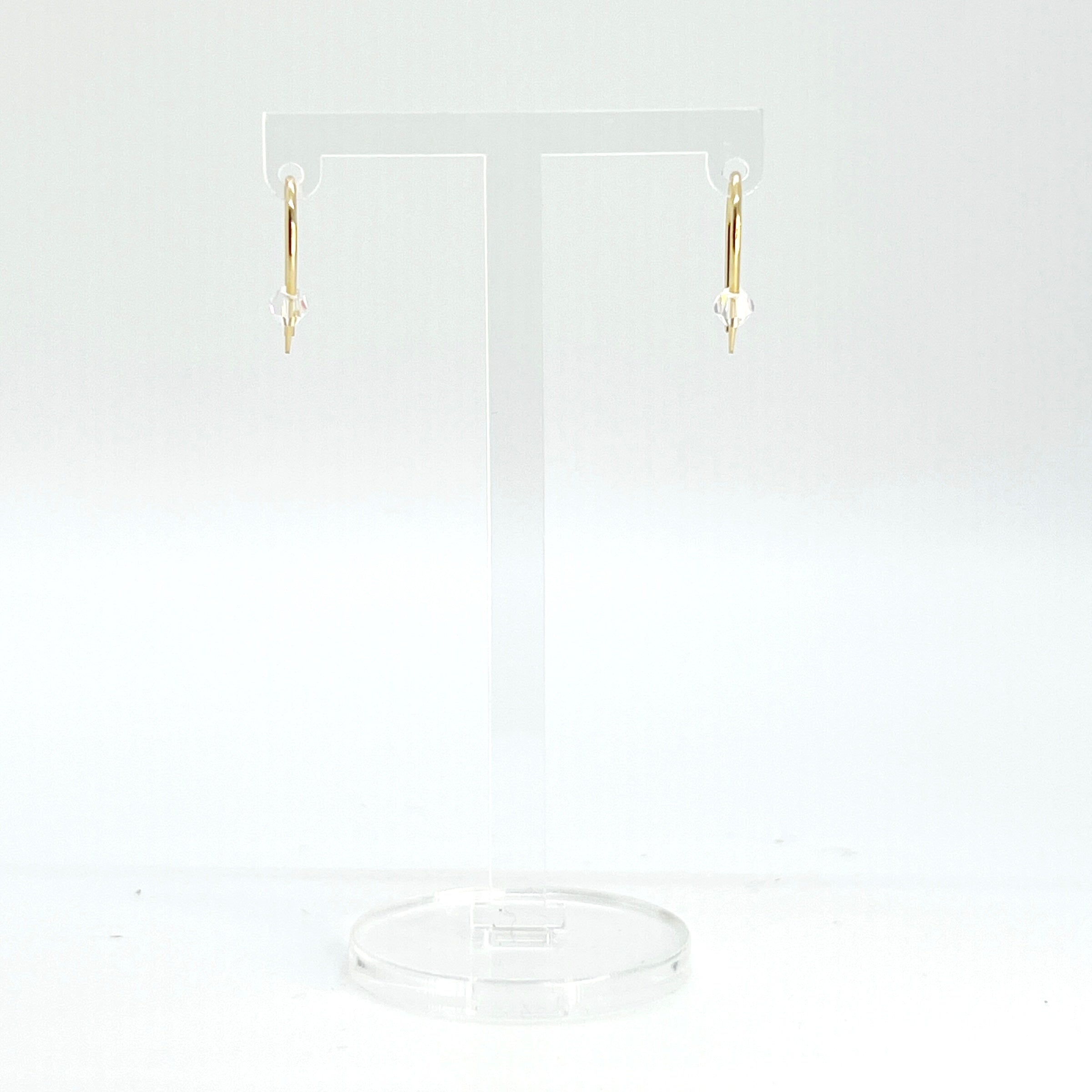 Simple and expressive, the Horseshoe Pull-Through Hoops are a fresh take on everyday earrings. Their petite arc shape hugs the lobe just right, while a single crystal adds a glint of light and intention. Minimal yet full of meaning, these are the earrings you’ll reach for again and again.