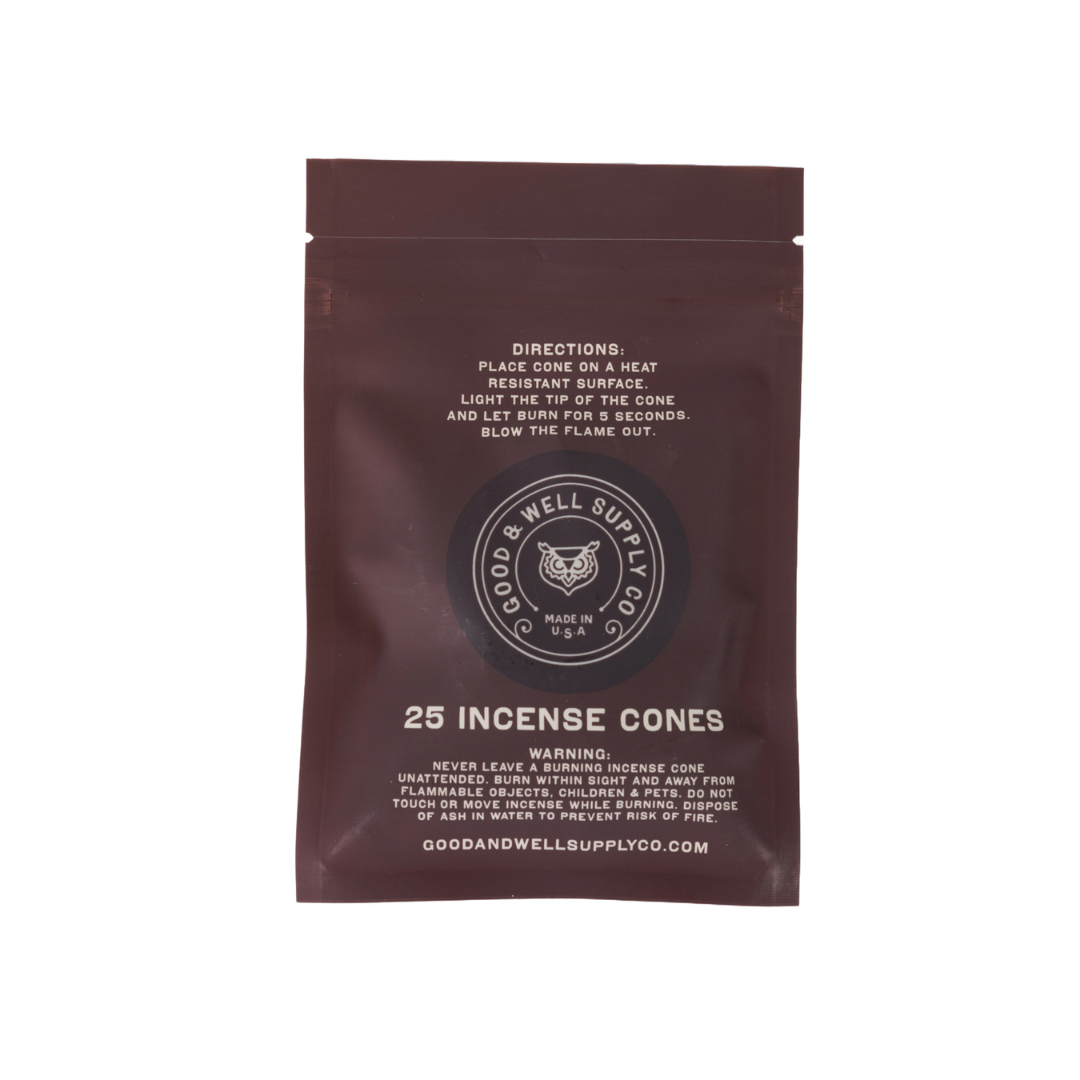 Brown package of incense cones with white text on a white background