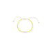 Chartreuse Irena bracelet with a 14k gold-filled bar on an adjustable cord, on white