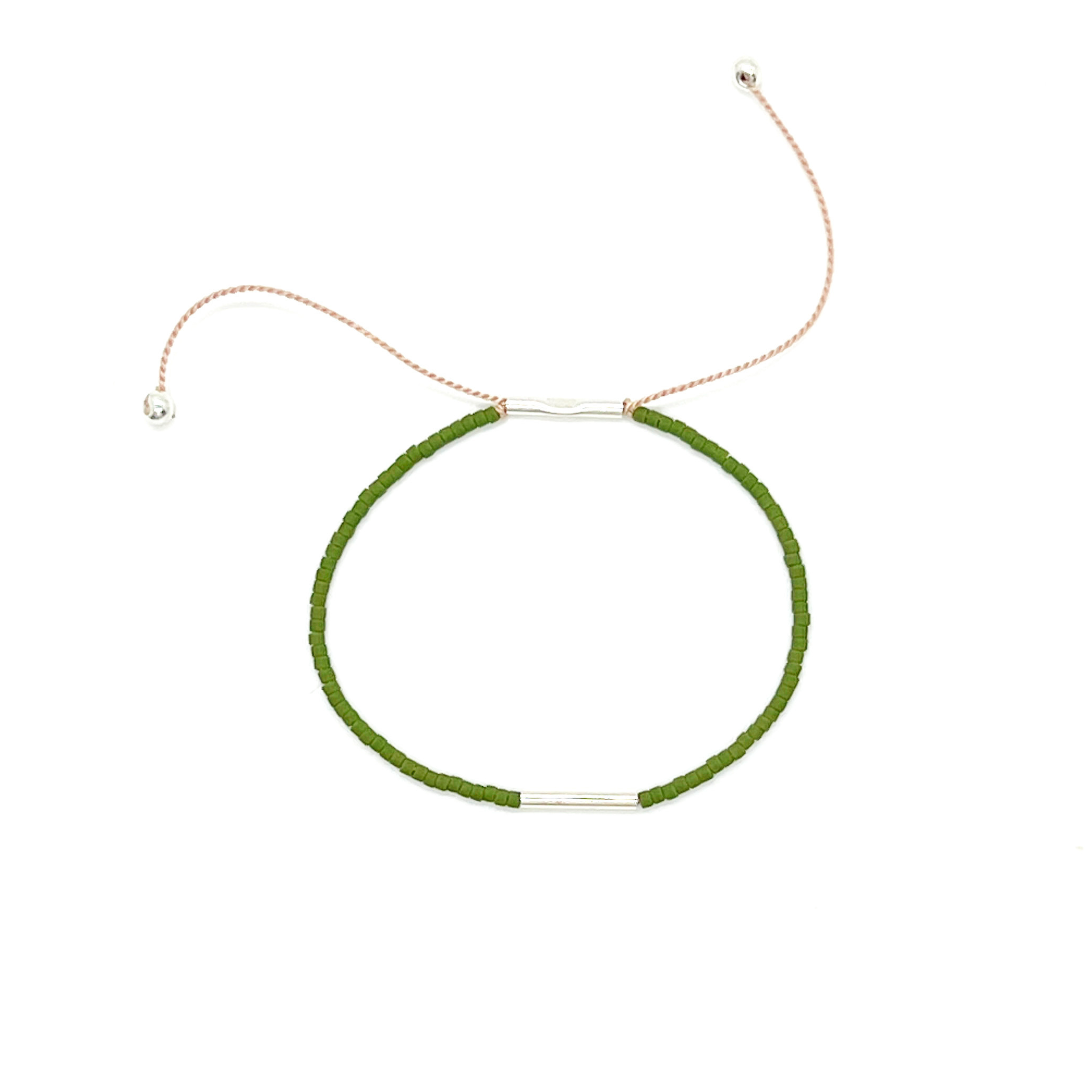 Pick your perfect color.

The Irena Anklet is made to order in your choice of color from a wide selection of solid hues. It’s an easy way to create something just for you.

Each anklet is handcrafted with beautiful Japanese glass beads on an adjustable cord that comfortably fits most ankles. You can choose from three metal finishes: 14k gold-filled with silk cord, sterling silver with silk cord, or brass with nylon cord. The Irena is simple, stackable, and uniquely yours.