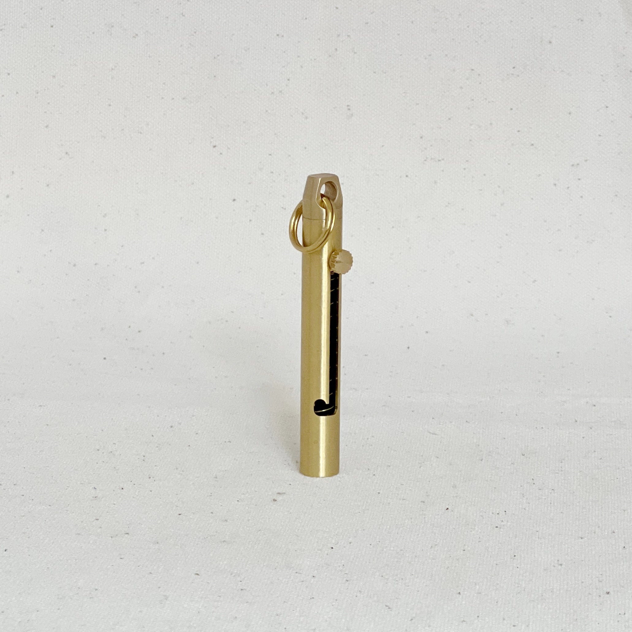 This brass mini folding knife is a compact, stylish EDC essential with a precision blade, smooth sliding mechanism, and timeless design. Durable and versatile.
