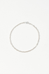Sterling silver mariner chain bracelet in a loop on a white background