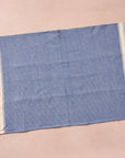 Brighten your kitchen with a pop of color and timeless charm. This striped woven tea towel blends function with simple elegance, featuring a refreshing blue and white base accented by three bold tan stripes at each end. Crafted from 100% cotton, it’s soft, absorbent and ready to tackle daily tasks - from drying dishes to lining a breadbasket. A convenient cotton loop in the corner makes it easy to hang and display. Whether you’re cooking up memories or cleaning up spills, this towel adds a cheerful, artisan