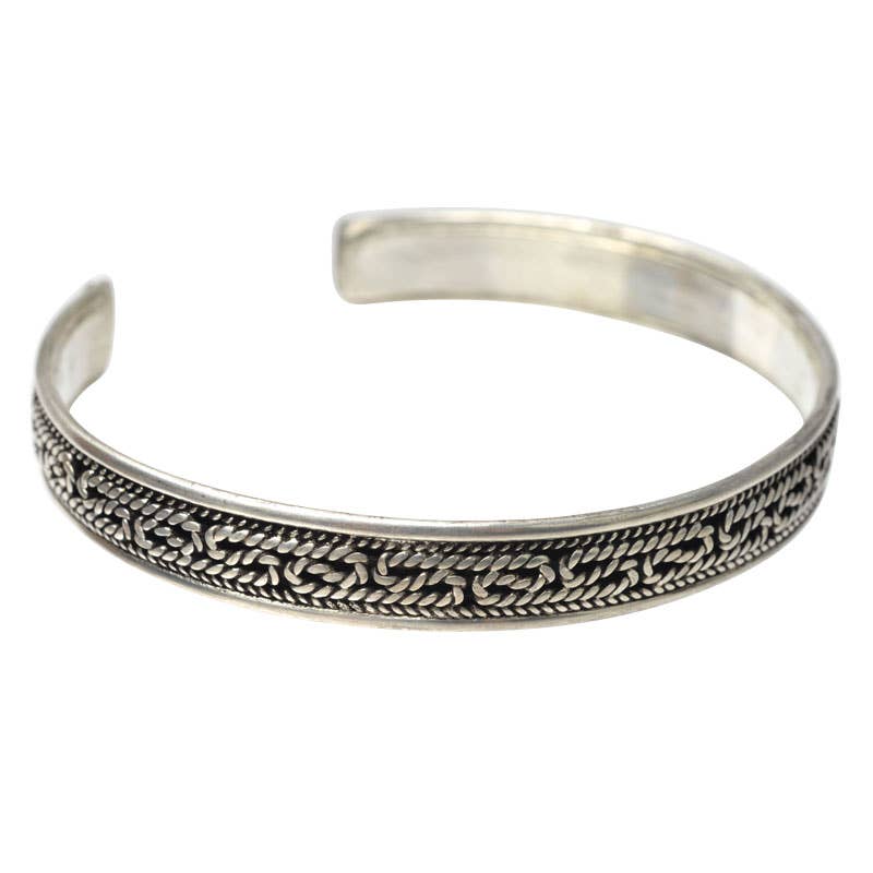 A clean, understated silver cuff with intricate rope detailing that works just as well stacked as it does worn alone. This minimalist men's cuff bracelet features an open cuff design that fits a variety of wrist sizes, making it the kind of everyday accessory that goes with everything — from casual to dressed up