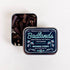 Tin of Badlands incense cones with decorative label on a white background