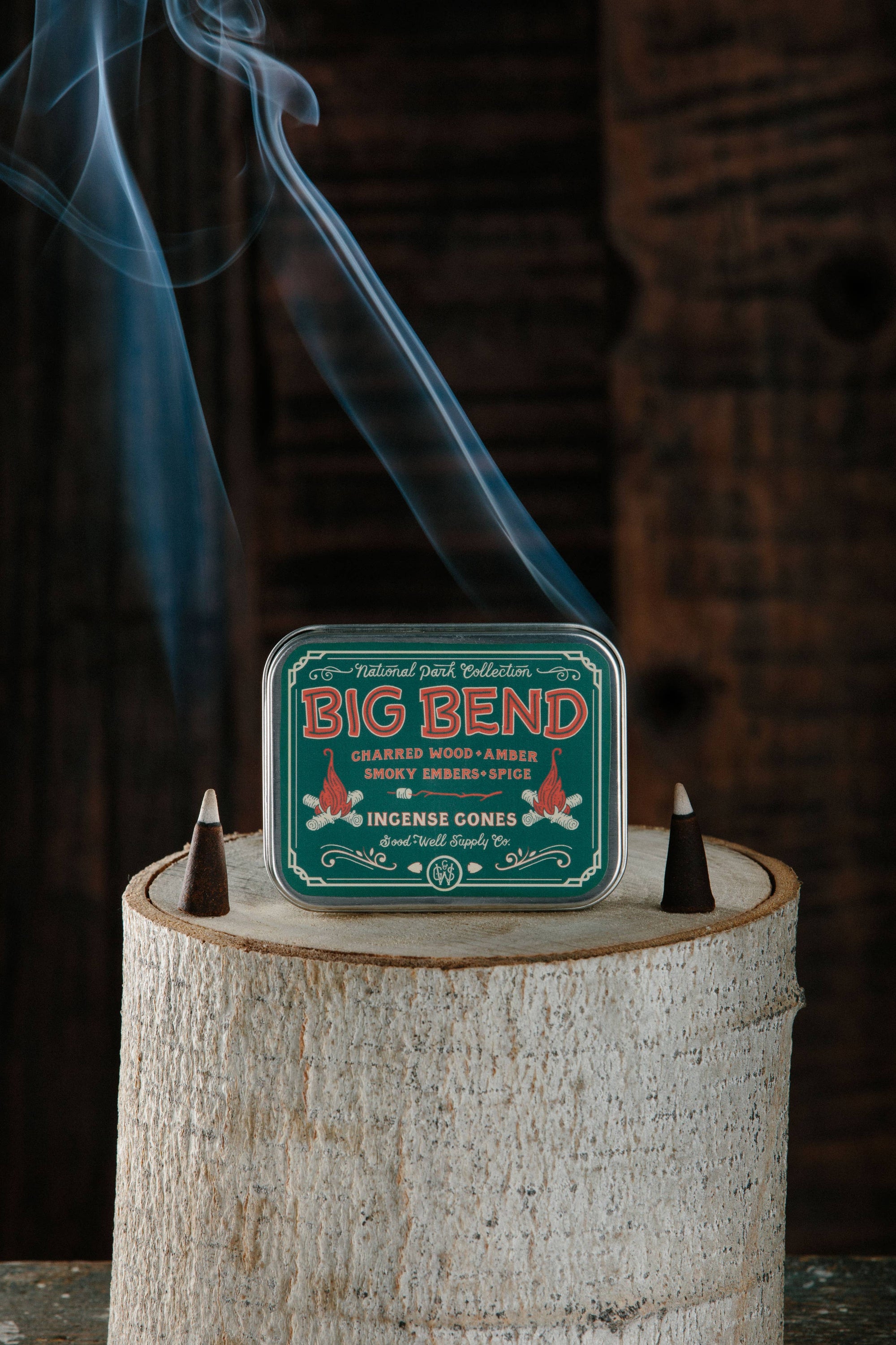 Indulge in the rich aromas of Big Bend National Park with Good &amp; Well Supply Co's hand-dipped incense cones. Encased in a robust aluminum tin, these cones are thoughtfully designed, with the lid serving as a convenient burning surface. With notes of charred wood, amber, smoky embers, and spice, you'll be transported to an evening camping in Big Bend.&nbsp;