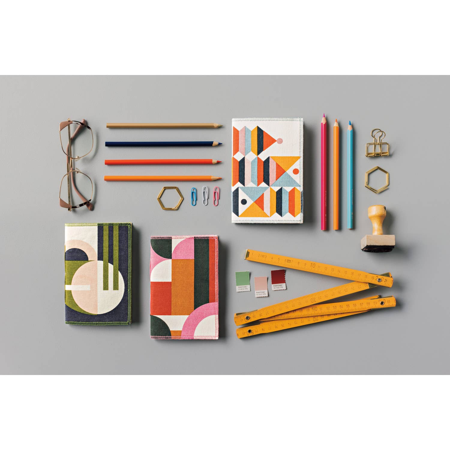 Pocket-sized notebook with Refract design and contrast stitching, inspired by the beauty of sand shaping into stone. Perfect for capturing creativity on the go.