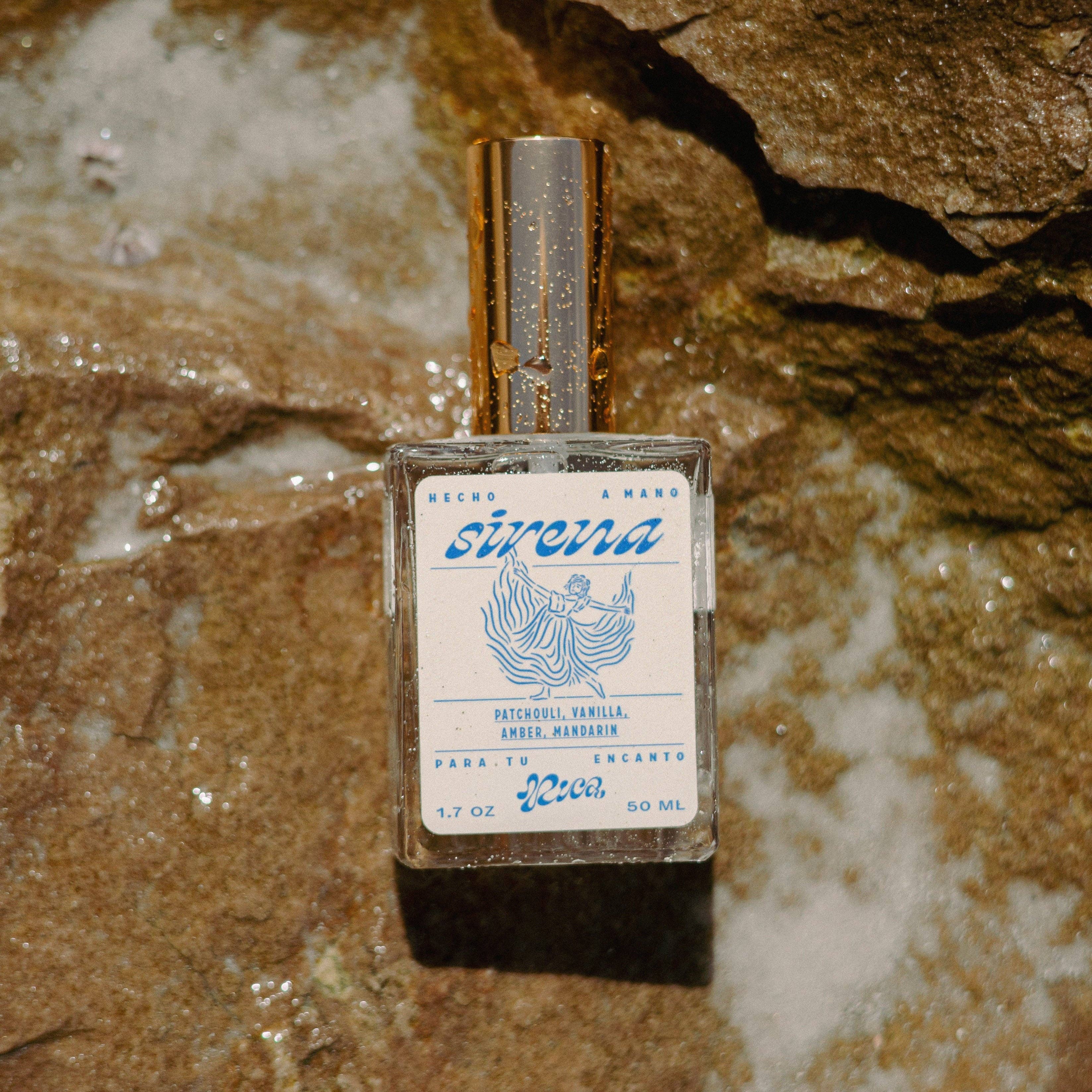 Answer the siren’s call with this Eau de Parfum Mist—a sparkling, layered fragrance inspired by the rhythm of the sea. Sparkling mandarin and ocean breeze meet creamy jasmine and soft vanilla waves, anchored by earthy patchouli and warm amber. This perfume mist is derived from essential oils and blended with organic sugarcane alcohol for a clean, lasting scent.

Top Notes: Sparkling mandarin, soft lavender, ocean breeze
Middle Notes: Jasmine cream, pepper
Base Notes: Patchouli, vanilla, amber