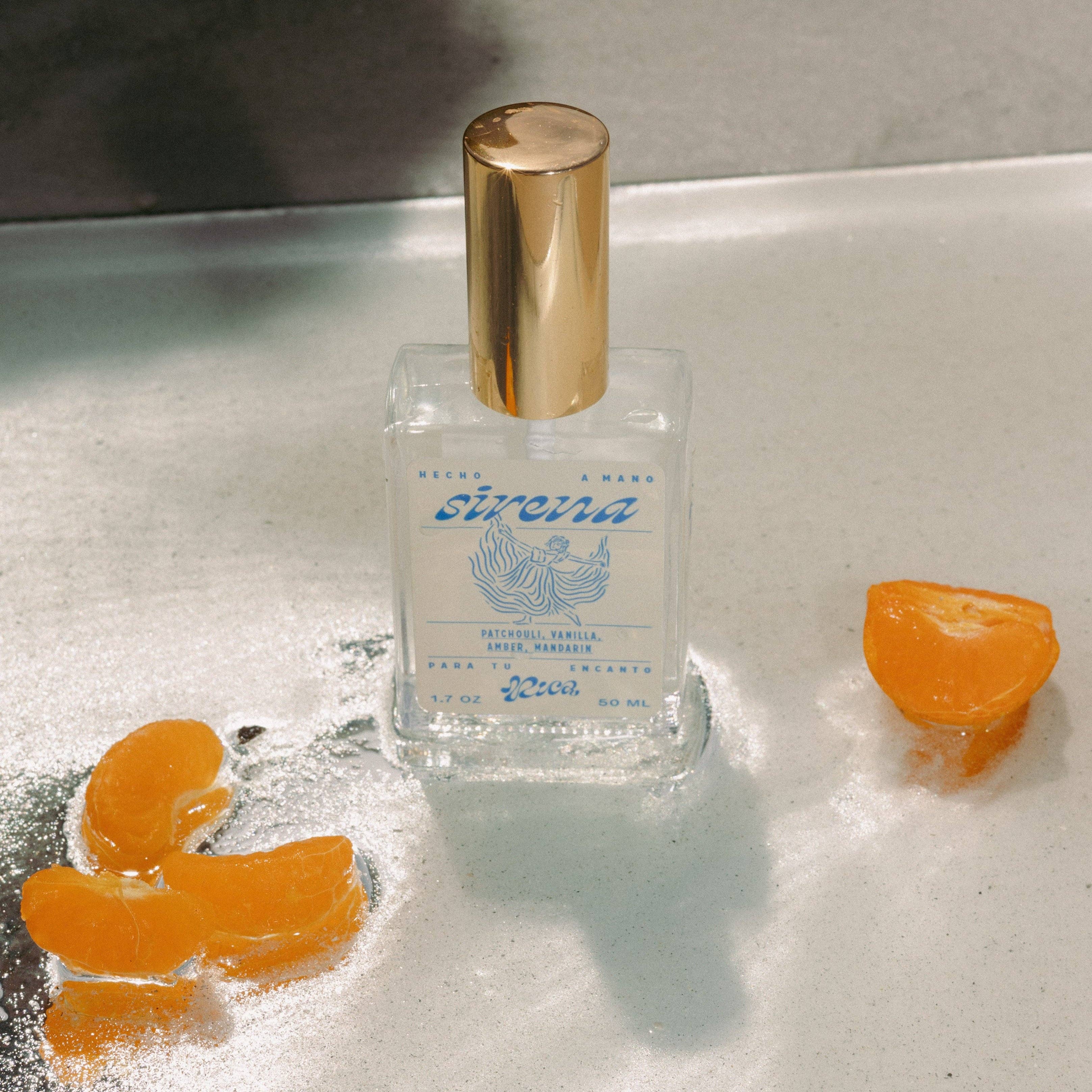 Answer the siren’s call with this Eau de Parfum Mist—a sparkling, layered fragrance inspired by the rhythm of the sea. Sparkling mandarin and ocean breeze meet creamy jasmine and soft vanilla waves, anchored by earthy patchouli and warm amber. This perfume mist is derived from essential oils and blended with organic sugarcane alcohol for a clean, lasting scent.

Top Notes: Sparkling mandarin, soft lavender, ocean breeze
Middle Notes: Jasmine cream, pepper
Base Notes: Patchouli, vanilla, amber