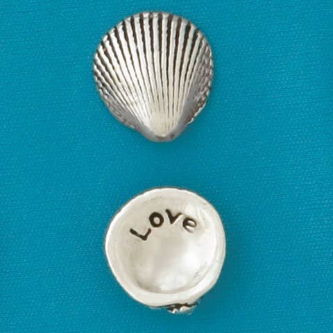 A meaningful keepsake, this pewter shell reveals "love" on the back. Great for collections, gifts, or sharing positivity. Handmade in Canada.