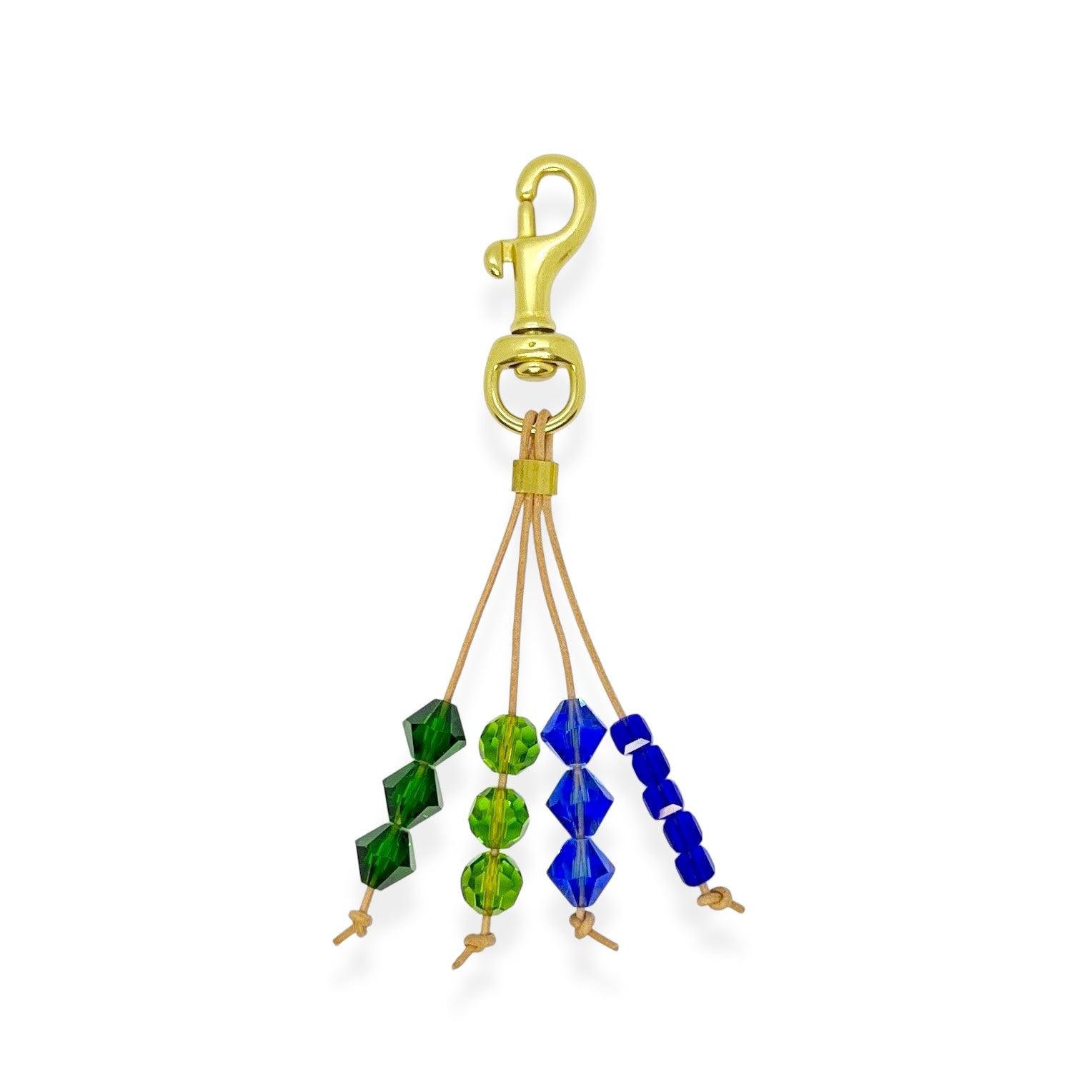Part accessory, part keepsake, this leather tassel charm adds a meaningful pop of color and texture to your everyday carry. With hand-cut crystals and solid brass hardware, it’s designed to clip easily onto your bag or keys for a bit of beauty and sparkle on the go.