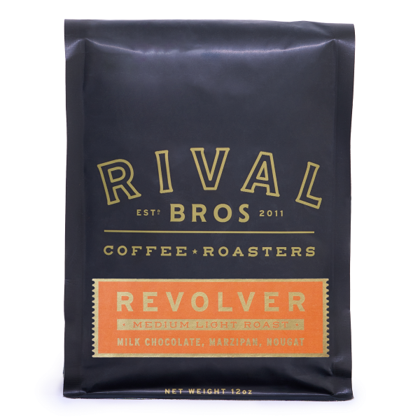 Black coffee bag with 'Rival Bros Coffee Roasters' branding on a white background