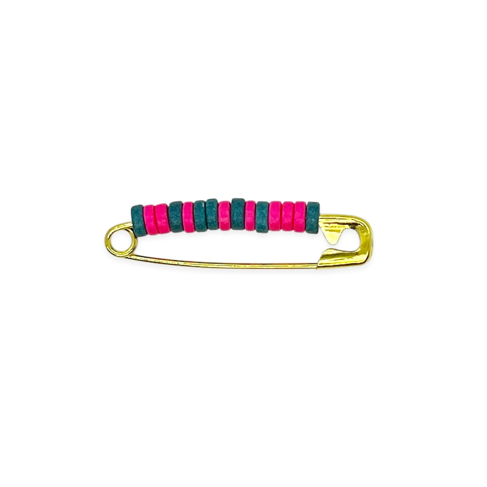 Inspired by the iconic pins from childhood brownie and scout days, our beaded safety pin shoe pin blends solid brass durability with colorful Greek ceramic beads for a fresh take on a classic. Each pin is crafted to add a playful, nostalgic touch to your favorite shoes, bags, or gear — a small symbol of friendship and adventure.