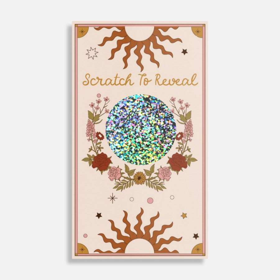 Product packaging with floral design and 'Scratch To Reveal' text on a beige background