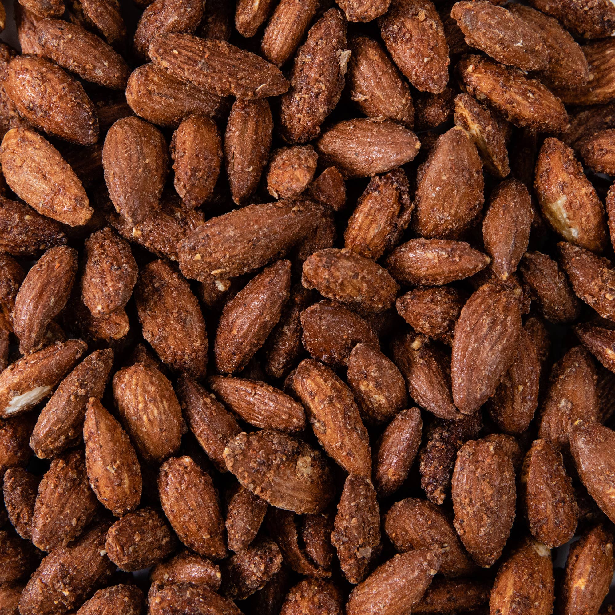 Get hooked on Giddy Up Nuts' Original Spiced almonds—small-batch California almonds packed with bold, all-natural spices for irresistible snacking!