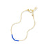 Septima Bracelet with cobalt blue glass beads on a gold chain, on white