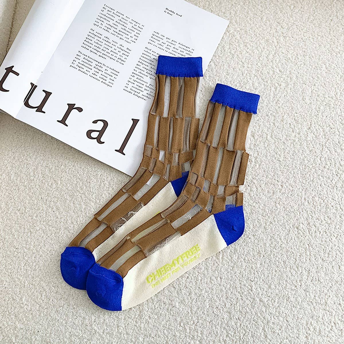 Step up your sock game with these fun, transparent sheer socks. Each pair features playful designs that add a subtle pop of personality to any outfit. Lightweight and breezy, they’re perfect for layering with sneakers, heels, or flats for a whimsical, stylish touch.