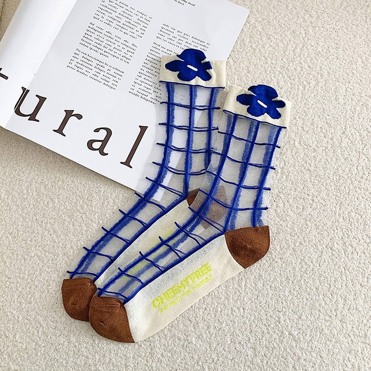 Step up your sock game with these fun, transparent sheer socks. Each pair features playful designs that add a subtle pop of personality to any outfit. Lightweight and breezy, they’re perfect for layering with sneakers, heels, or flats for a whimsical, stylish touch.