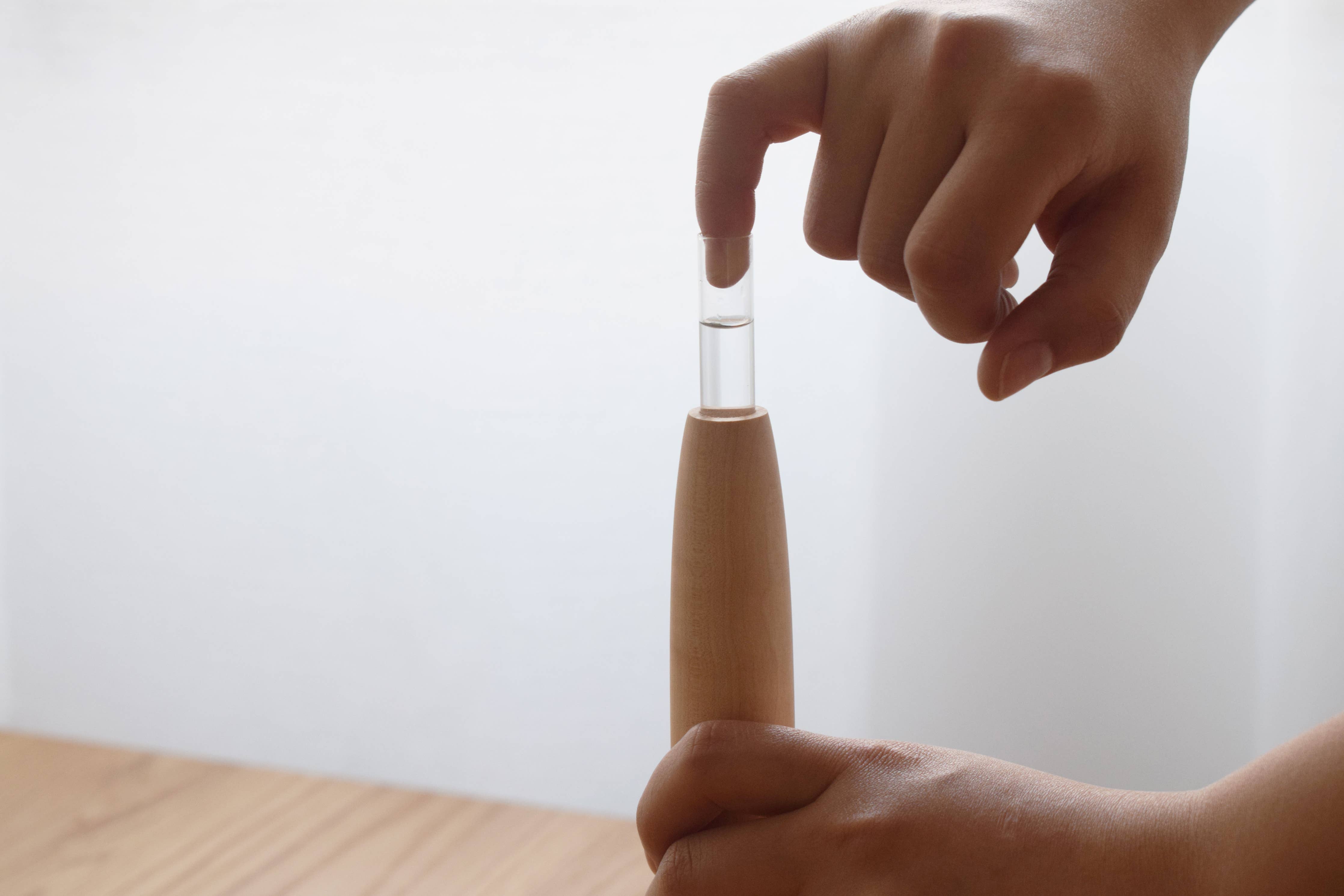 Crafted from fine maple wood and delicately polished, this single flower vase embodies the elegance of Eastern Zen aesthetics. Minimal yet refined, it adds a serene touch to any space—perfect for home décor or as a thoughtful housewarming gift.