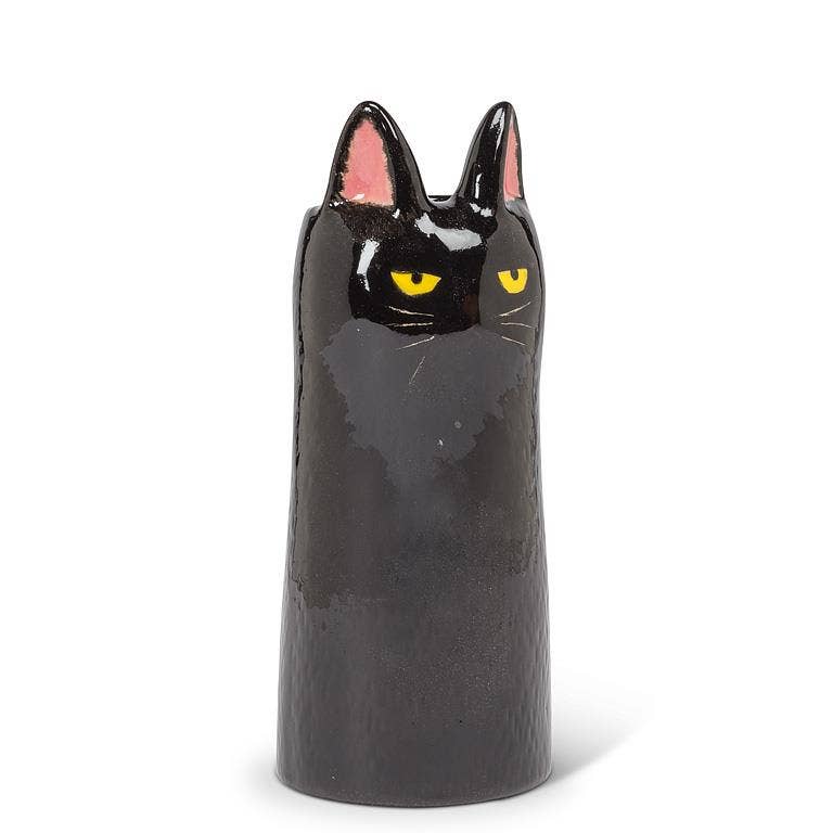 Add the purr-fect touch to your decor with this sleek Cat Vase. Featuring a modern silhouette, this striking feline is finished in a glossy glaze, accentuated by piercing eyes and delicate ears. Whether displayed alone or as part of a collection, these cat vases bring a touch of cattitude to any space.