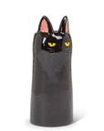 Add the purr-fect touch to your decor with this sleek Cat Vase. Featuring a modern silhouette, this striking feline is finished in a glossy glaze, accentuated by piercing eyes and delicate ears. Whether displayed alone or as part of a collection, these cat vases bring a touch of cattitude to any space.