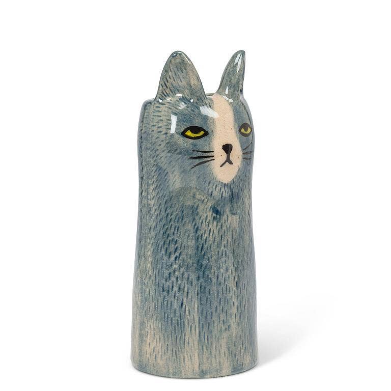 Add the purr-fect touch to your decor with this sleek Cat Vase. Featuring a modern silhouette, this striking feline is finished in a glossy glaze, accentuated by piercing eyes and delicate ears. Whether displayed alone or as part of a collection, these cat vases bring a touch of cattitude to any space.